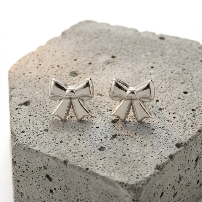 Minimalist Cute Three-Dimensional Bow Earrings Vacuum-plated stainless steel ribbon bow earrings Women's Sweet Daily Accessories