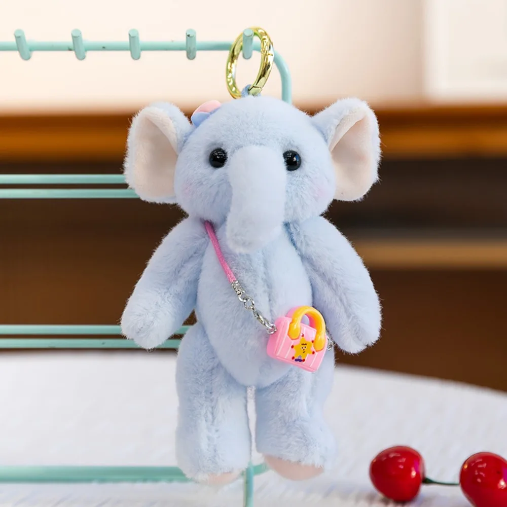 พวงกุญแจตุ๊กตาช้างการ์ตูน พร้อมกระเป๋าสะพาย  ตุ๊กตาช้างขนนุ่ม 15 ซม. น่ารัก สำหรับเด็กผู้หญิง