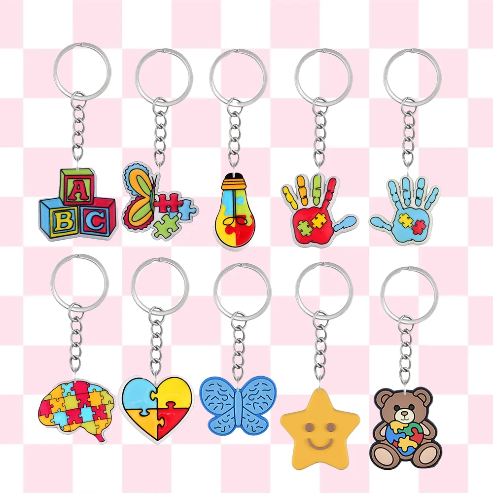 Set of 10 Vibrant Keychains Featuring Autism Puzzle Themes, Including Designs of Butterflies, Bears, And Other Adorable Motifs