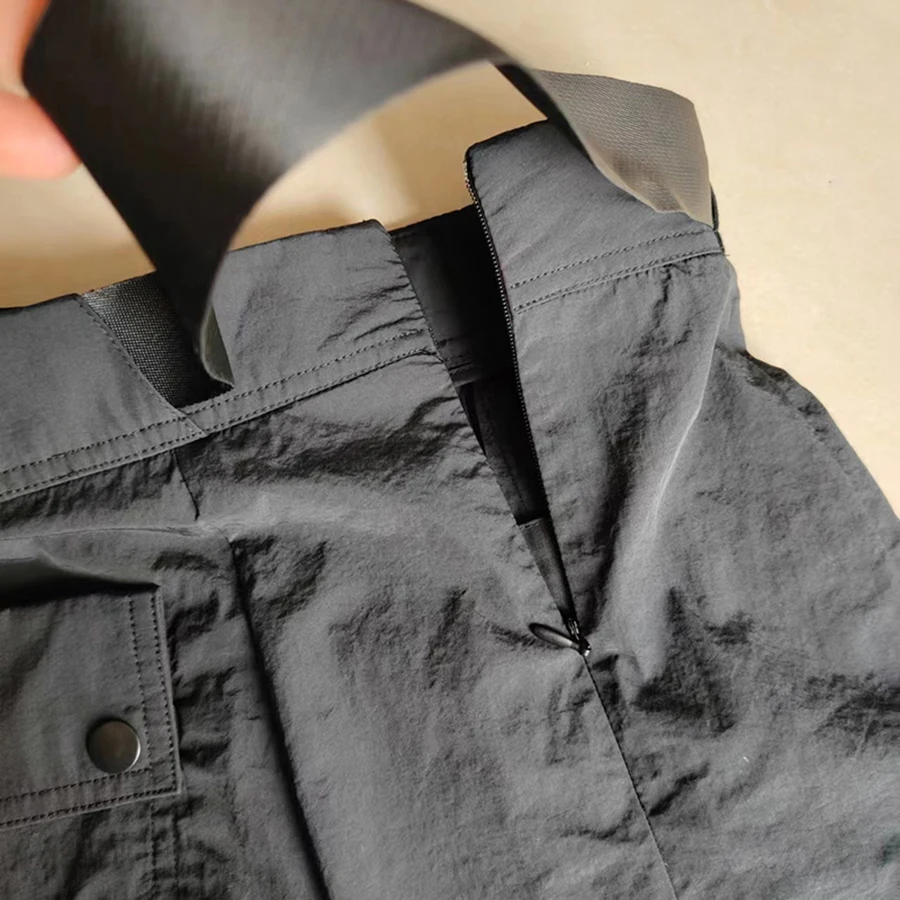 Damen High-Waist A-Linien-Shortsrock mit verstellbarem Gürtel, Seitentaschen & Schlitz am Saum – Schwarzes, vielseitiges Outfit für die legere Bürodame – Detail 21