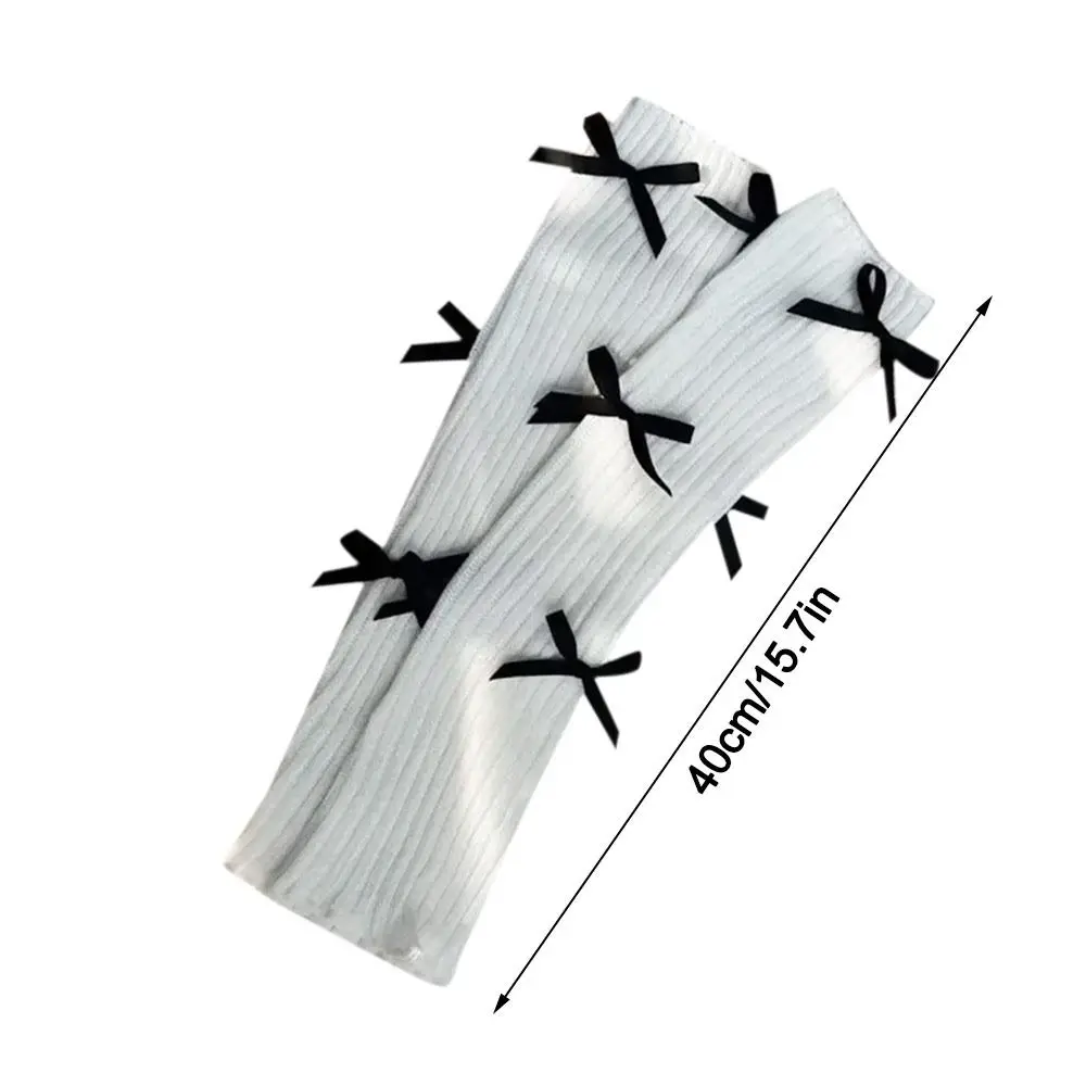 Scaldamuscoli lavorati a maglia con nodo a fiocco casual 40 cm Copri piedi con trama lavorata a maglia Calzini termici bianchi neri lavorati a maglia Autunno Inverno