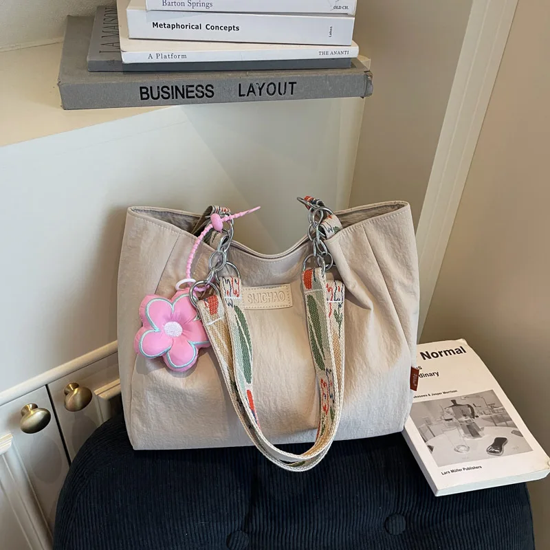 

Новинка 2023 года, легкая водонепроницаемая большая сумка для женщин, сумка через плечо с ремешком-цепочкой, прочная парусиновая сумка через плечо, повседневная и универсальная