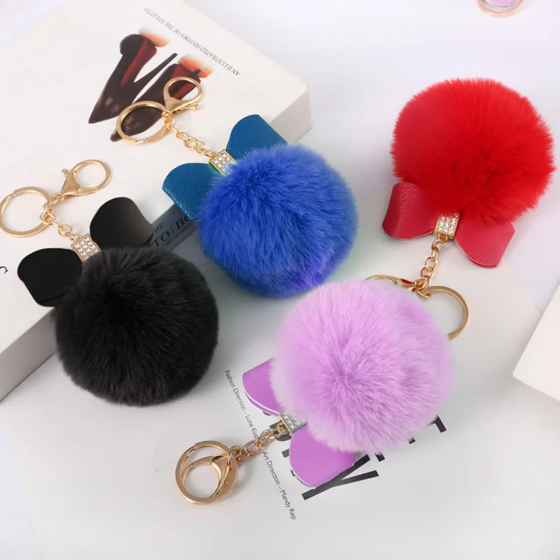 Llaveros de bola de pelo de conejo de peluche con lazo de cuero con diamantes de imitación, llavero con pompón de piel sintética, colgante para bolso, llavero de coche para regalos de mujer