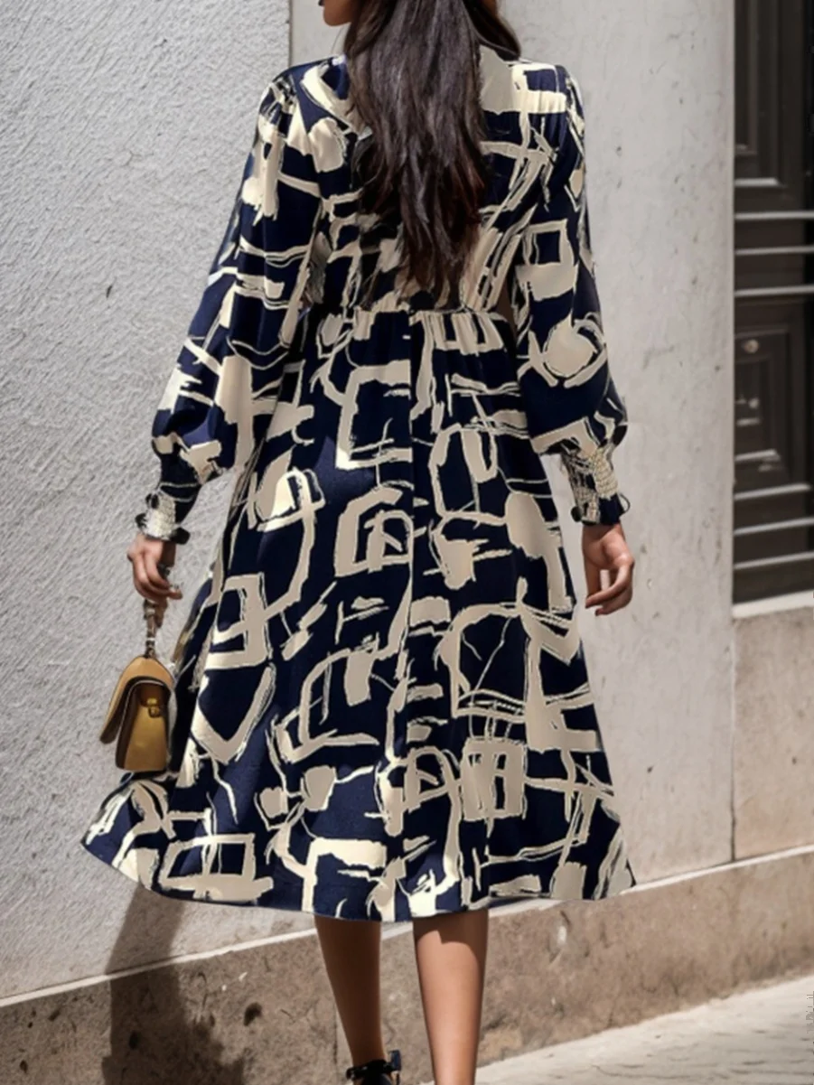 فستان ميدي نسائي بتصميم هندسي ربيعي، بأكمام طويلة وطوق قائم، من ألياف البوليستر، بخصر طبيعي وتصميم على شكل حرف H.