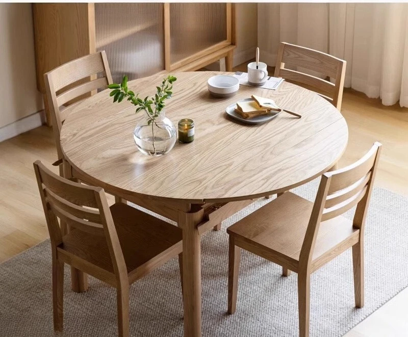 

Бытовой круглый стол из массива дерева из шифера и дуба. Обеденный стол для небольшой квартиры. Простой, современный и выдвижной.