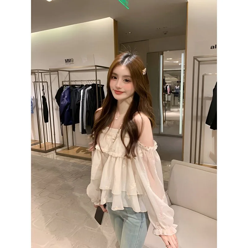 

Elegant Short Lace Blouse with Lantern Sleeves And One-Shoulder Design Unique And Beautiful Early Spring Fashion Top for Women