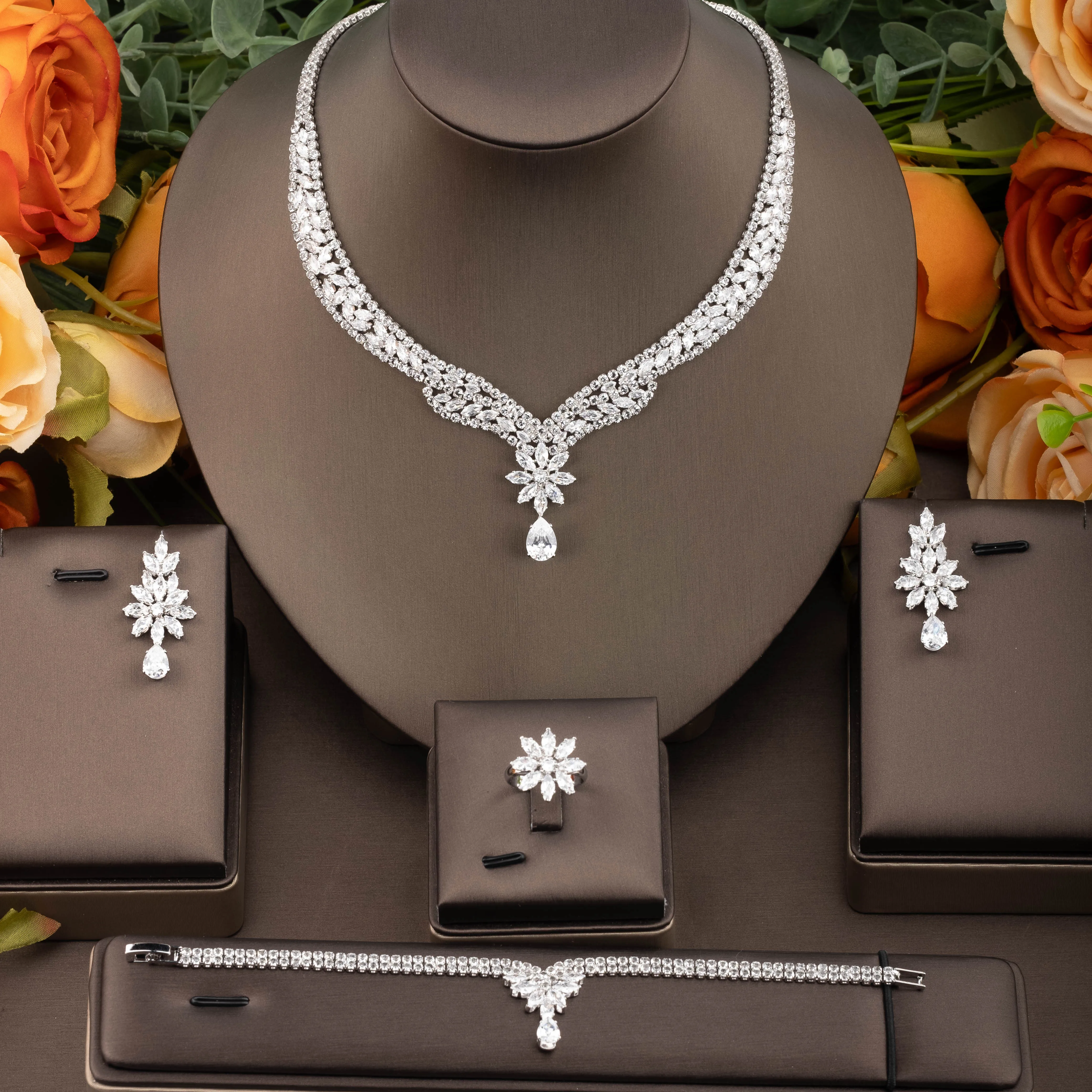 1 set of luxurious and elegant jewelry set with sparkling cubic zirconia in sunflower and teardrop shapes, suitable for women to wear at parties and banquets. Gift box not included