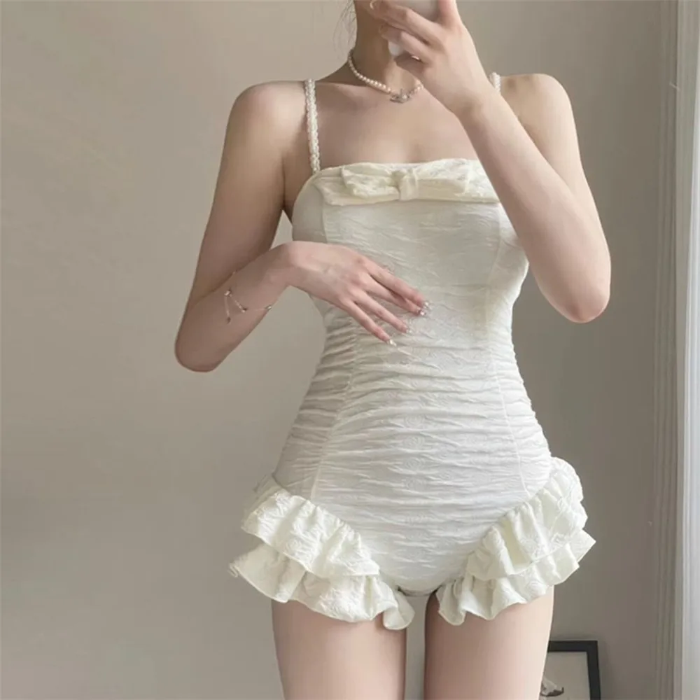 الحلو الأبيض القوس تكدرت ملابس السباحة الكورية الموضة المحافظة قطعة واحدة ملابس السباحة النقش ثوب السباحة عطلة ملابس الشاطئ 2025