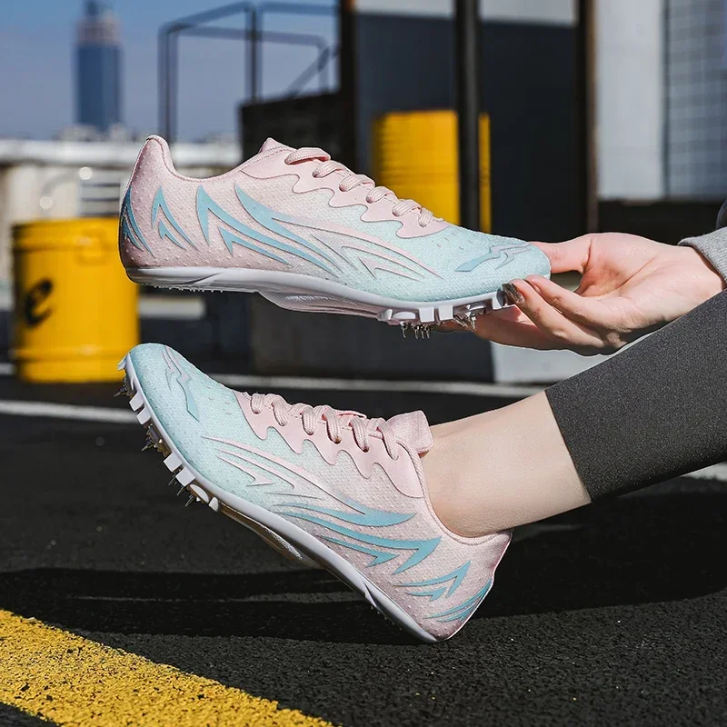 

Men Track Spike Field Jumping Footwears Training Sneakers Jump Shoes Running Lace-up Soft Lightweight Racing Match Professional