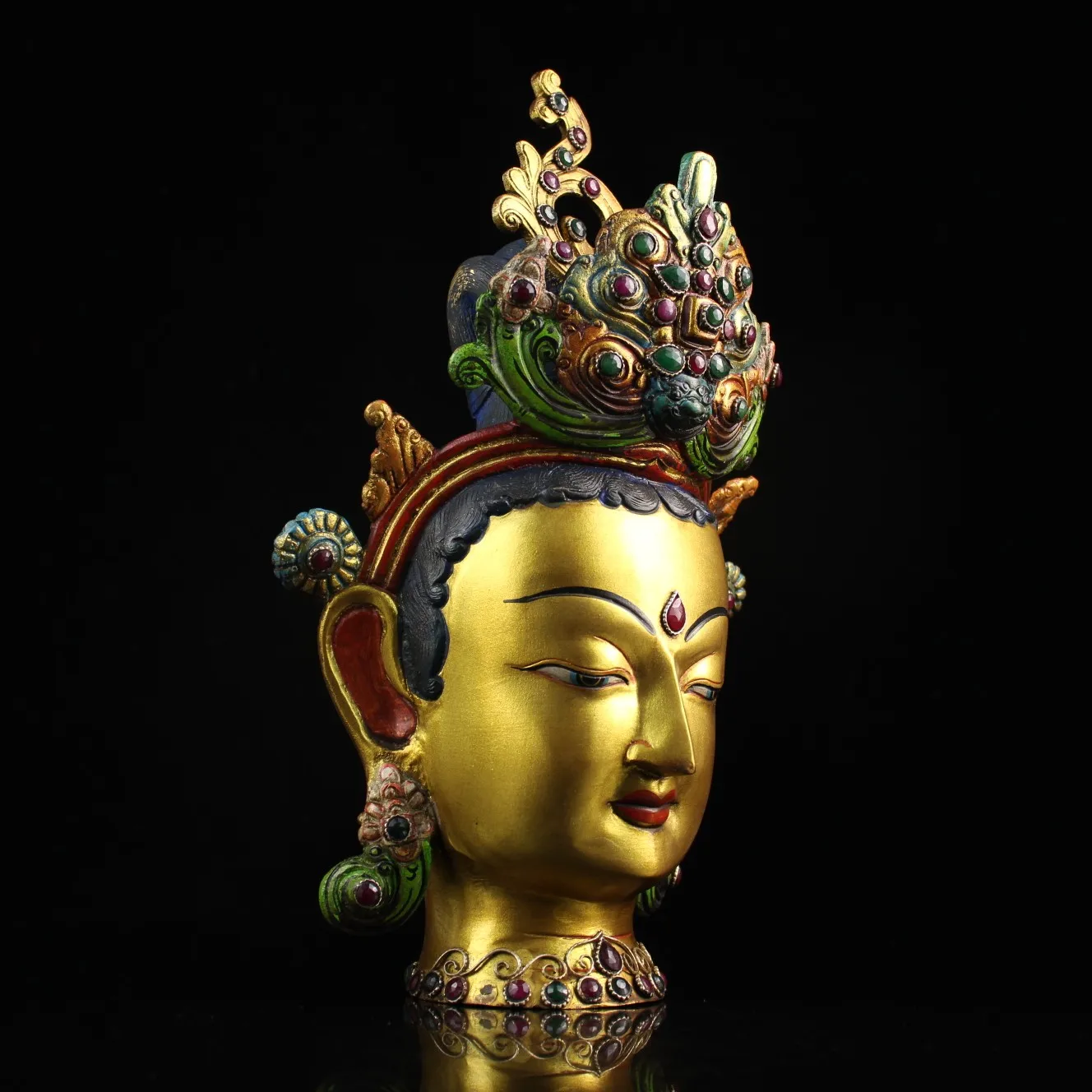 Tibetan handicraft, hand-crafted with inlaid gemstones, featuring a painted and gilded Tibetan Buddhist Green Tara head