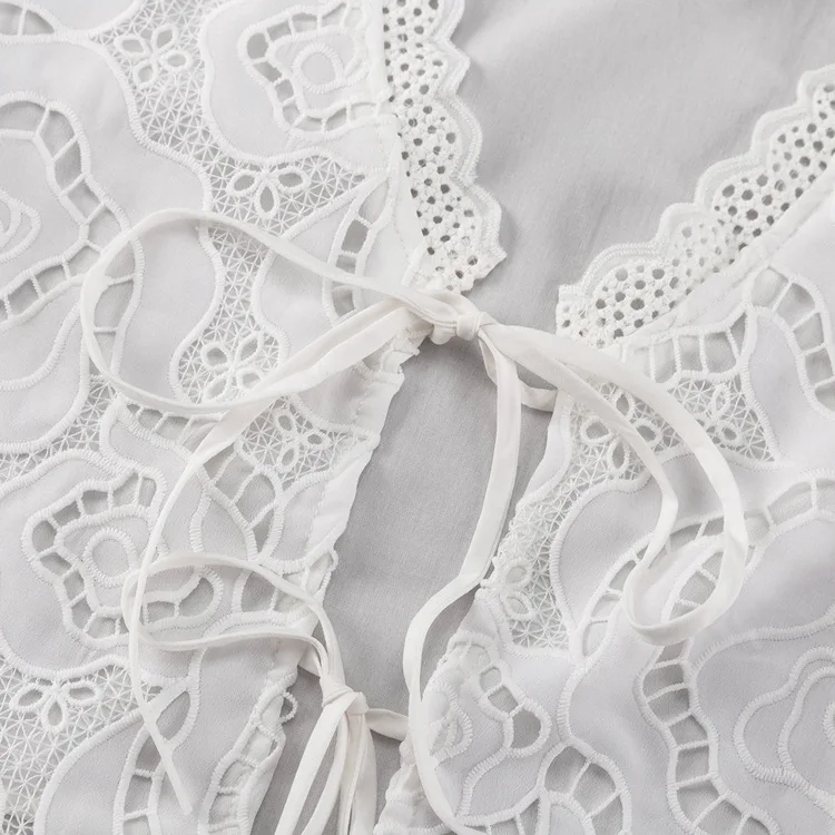 Algodão oco costura design terno feminino 2025 verão novo decote em v manga curta rendas topo e shorts terno de duas peças