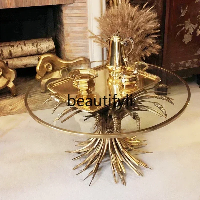 

Smt14 New Italian light luxury glass dining table modern art creative living room household stainless steel rice ears round dini