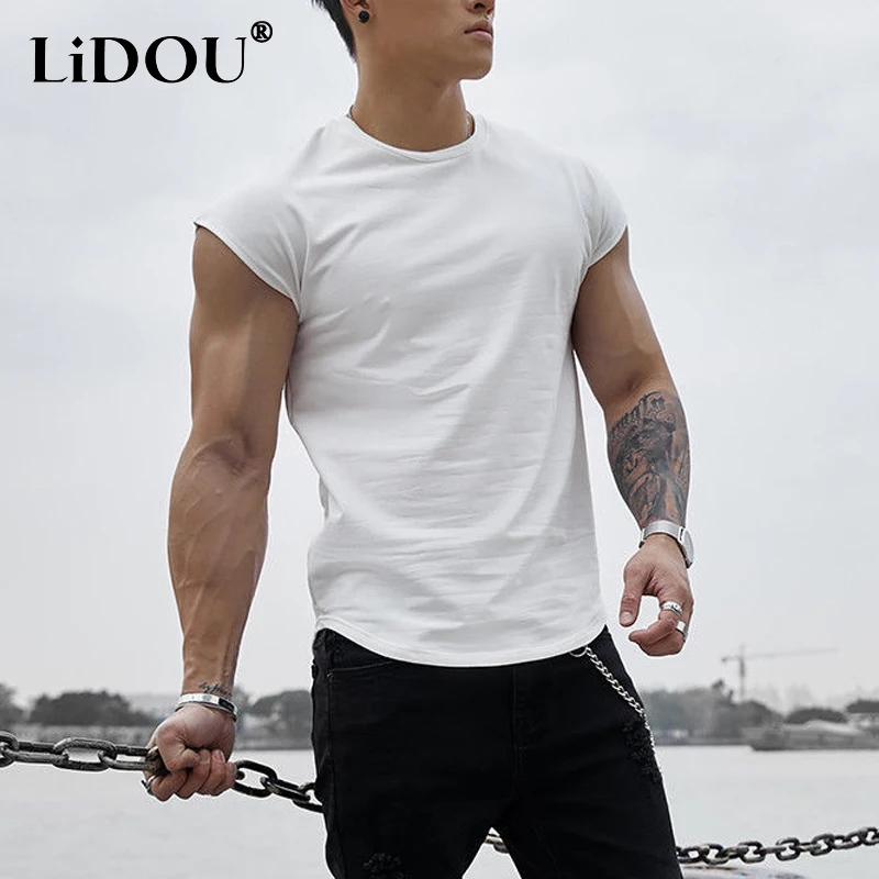 Fashion Loose Sleeveless Men\'s Clothing 2023 Summer New Solid Color Cotton Round Neck Vest Motion Bodybuilding Quick Drying Tops