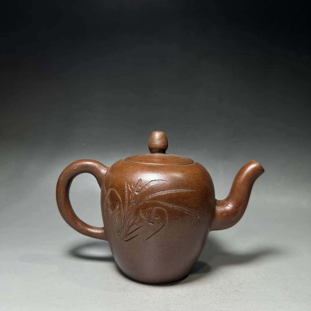 The Classic Purple Clay Teapot is Finely Crafted and Exquisitely Shaped Making it a Home Craft Worth Decorating and Collecting