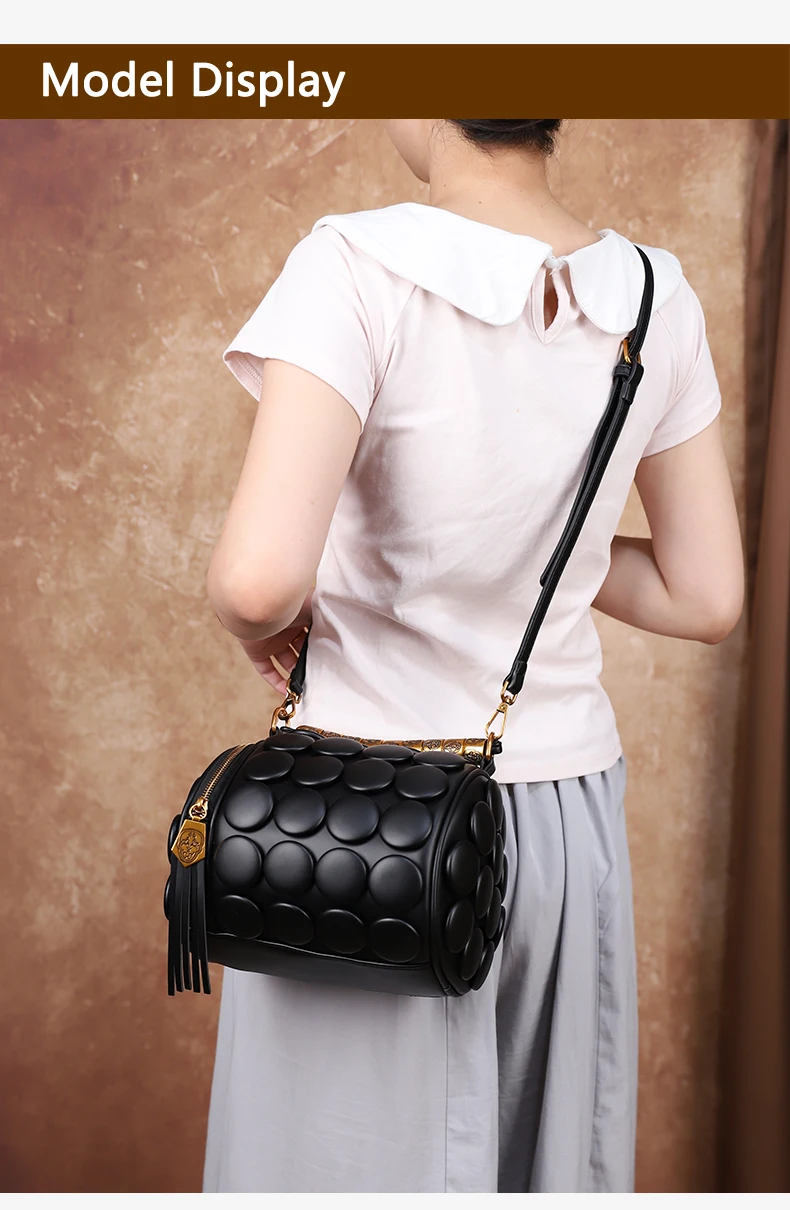 2026 Neues Design Damen Retro-Knopf-Lederhandtaschen Luxuriöse High-End Runde Röhrenförmige Bucket Bag Neue Mode Schulter-Umhängetasche – Detail 5