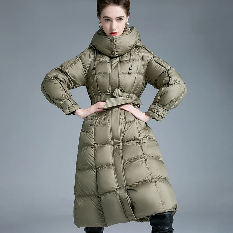 เสื้อโค้ทพัฟเฟอร์มีฮู้ดแบบยาวพิเศษสำหรับผู้หญิง สีเขียวมะกอก แจ็คเก็ตบุใยสังเคราะห์แบบควิลท์ พร้อมปลายแขนเสื้อปรับได้และกระเป๋าด้านหน้า เสื้อคลุม
