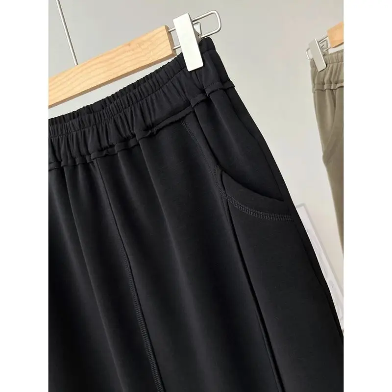 Minimalist Summer Thin Style Women\'s Solid Color Elastic Waist Pocket Split Fashion Office Lady Loose Mid-length A-line Skirt