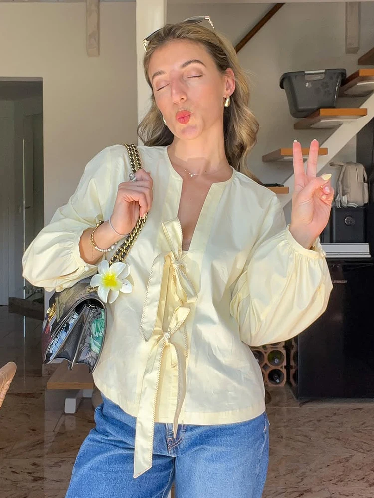 

Chic Hollow Out Pleated Blouses Women Loose Fit Long Flare Sleeve Chiffon Shirts 2025 V-neck Lace Up Street Fashion Comfort Tops