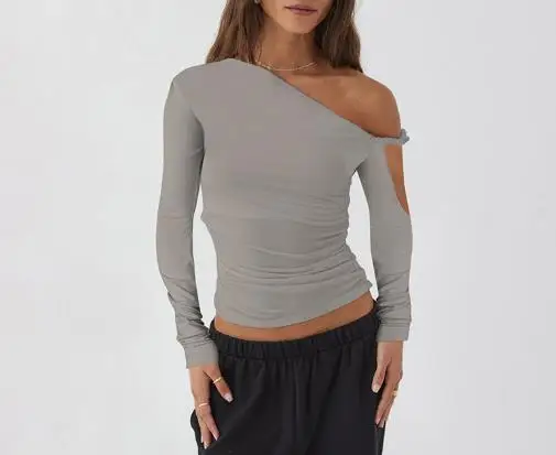 女性の秋の新ソリッドカラーシングルショルダー斜め襟折り非対称セクシーな長袖トップ女性のための