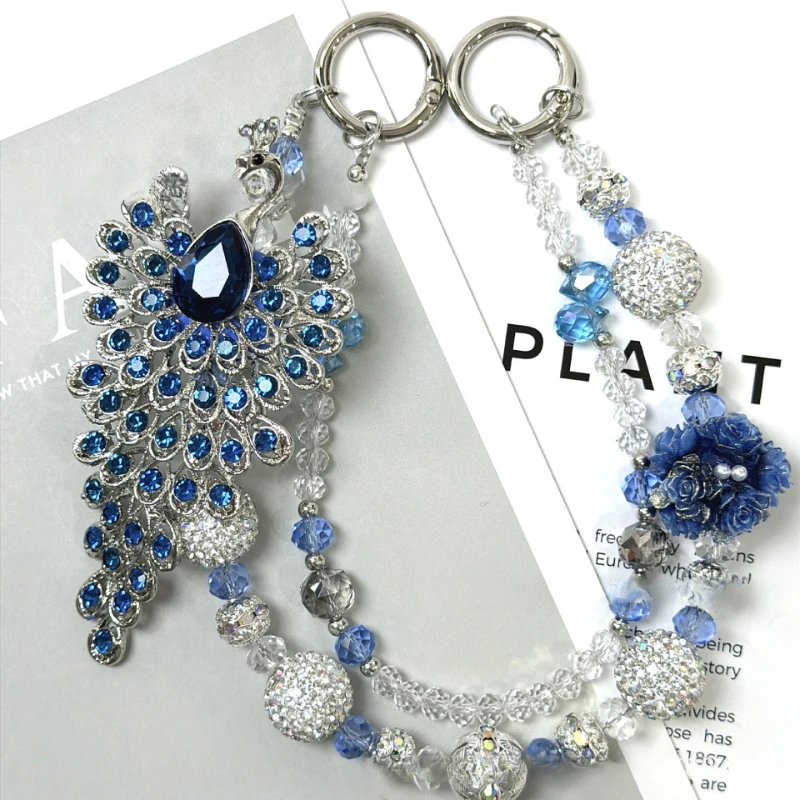 

The new colorful peacock mobile phone chain is suitable for mobile phone cases, portable lanyards, light luxury temperament, socialite keychain, pendant, rich woman chain.