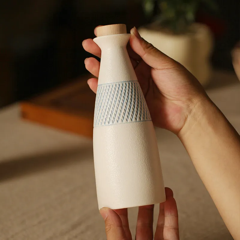 Ceramic Sake Bottle White Textured Liquor Decanter with Wooden Stopper Blue Pattern Band For Home Bar Sake Serving Table Decor view 5