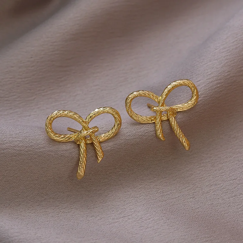 Cute Hollow Bowknot Stud Earrings Golden Color Metal Small Earrings for Women Simple Jewelry