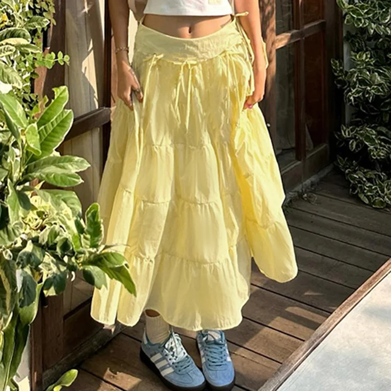 

Europe and the United States holiday wind summer dopamine yellow skirt women low waist bow splicing slimming long dress