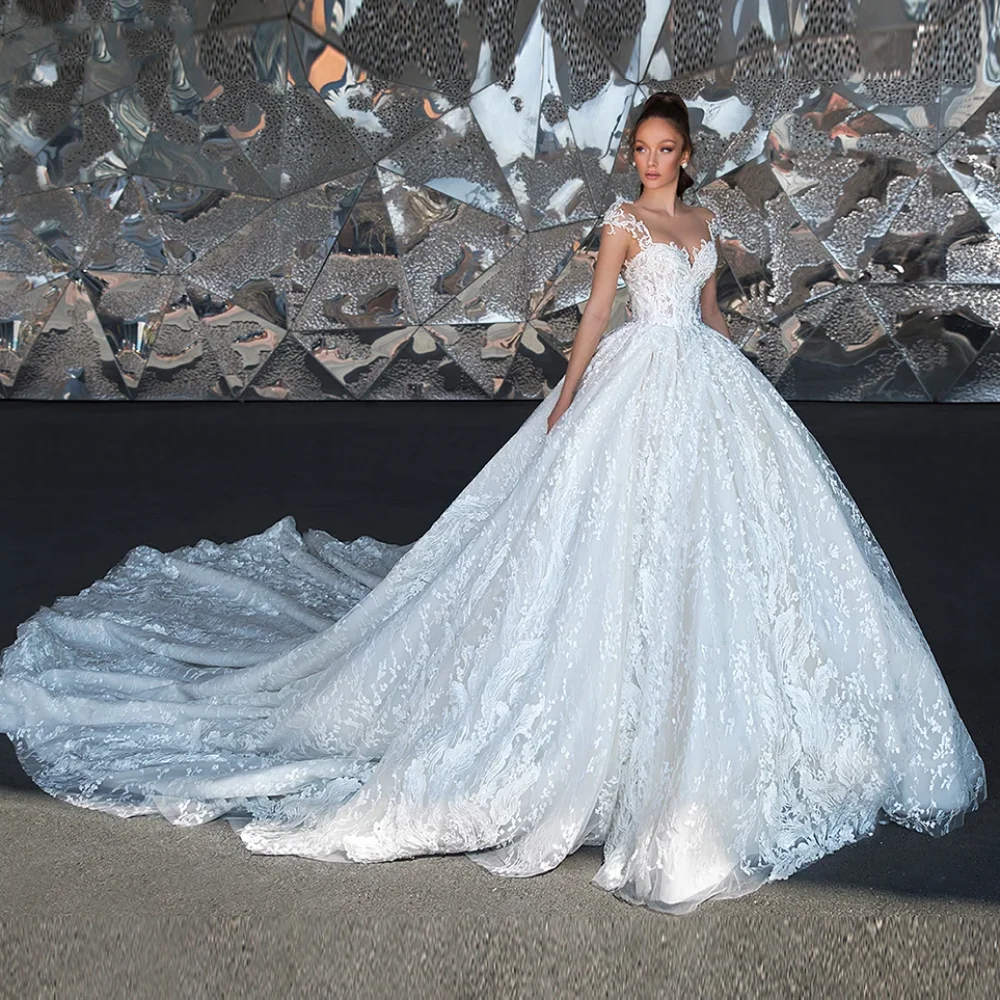 Aangepaste sexy backless retro trouwjurk elegante kanten sticker korte mouwen a-lijn bruidsjurk kathedraal trein gewaad