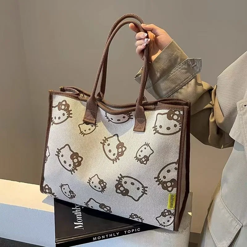 2026 Nuevos bolsos con estampado de gato Katty y bolso de hombro informal versátil a la moda, bolsos de lona de gran capacidad
