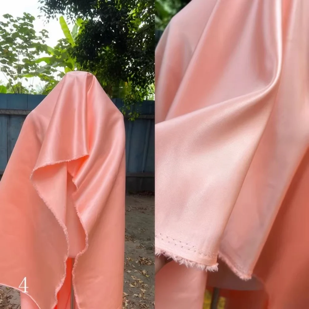 

Orange pink glossy satin fabric, thick satin design, high-end wedding dress, princess dress diy fabric