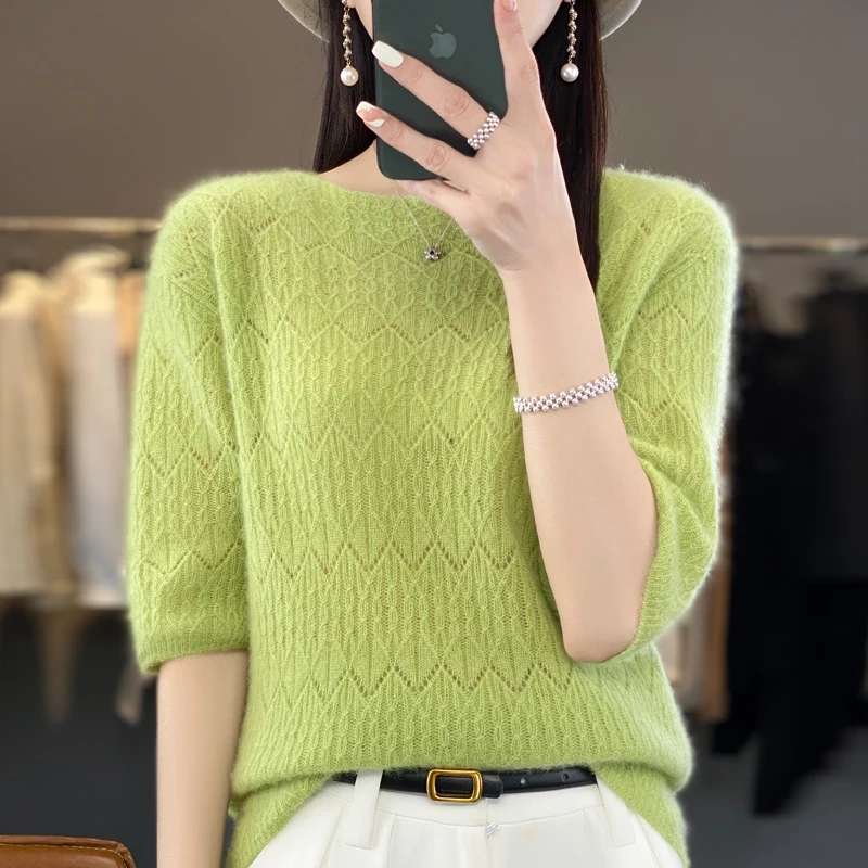 Summer new ladies 100% pure wool O-neck solid color knitted short sleeve thin hollow fashion loose T-shirt.