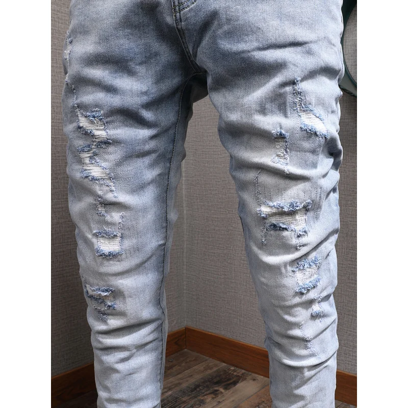 Light colored casual jeans for men, slim fit with small feet and elastic Korean style trendy and versatile casual ripped pants