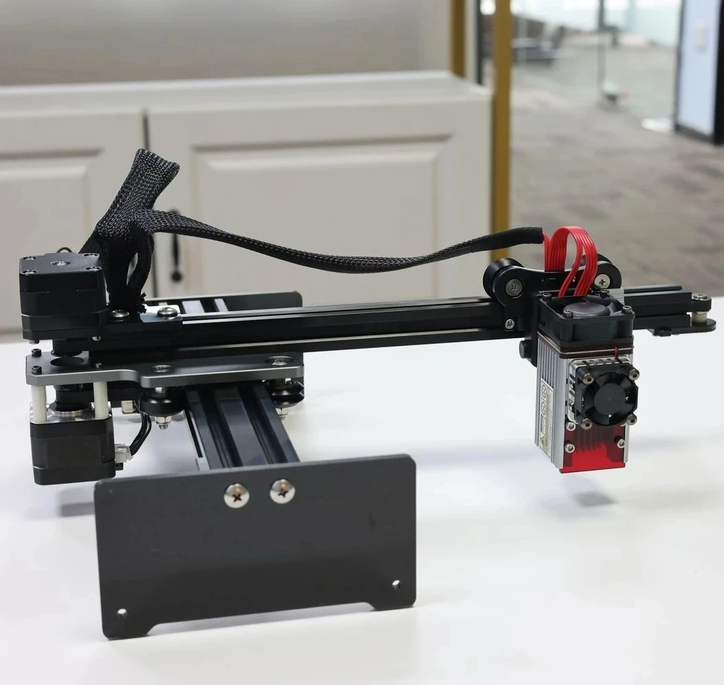 

5 A40640 Laser Engraving and Cutting Machine Engraving wood, leather, plastic, glass, stainless steel