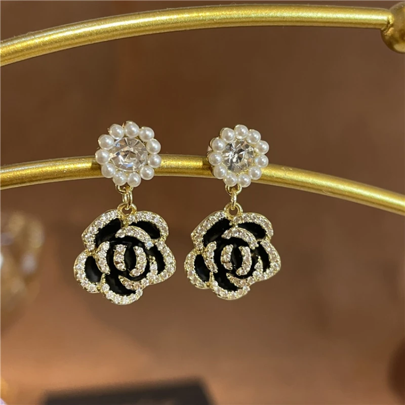 Korean Version Fashionable and Elegant Circular Pearl High-end Feeling Micro Inlaid Camellia Earrings for Girls.