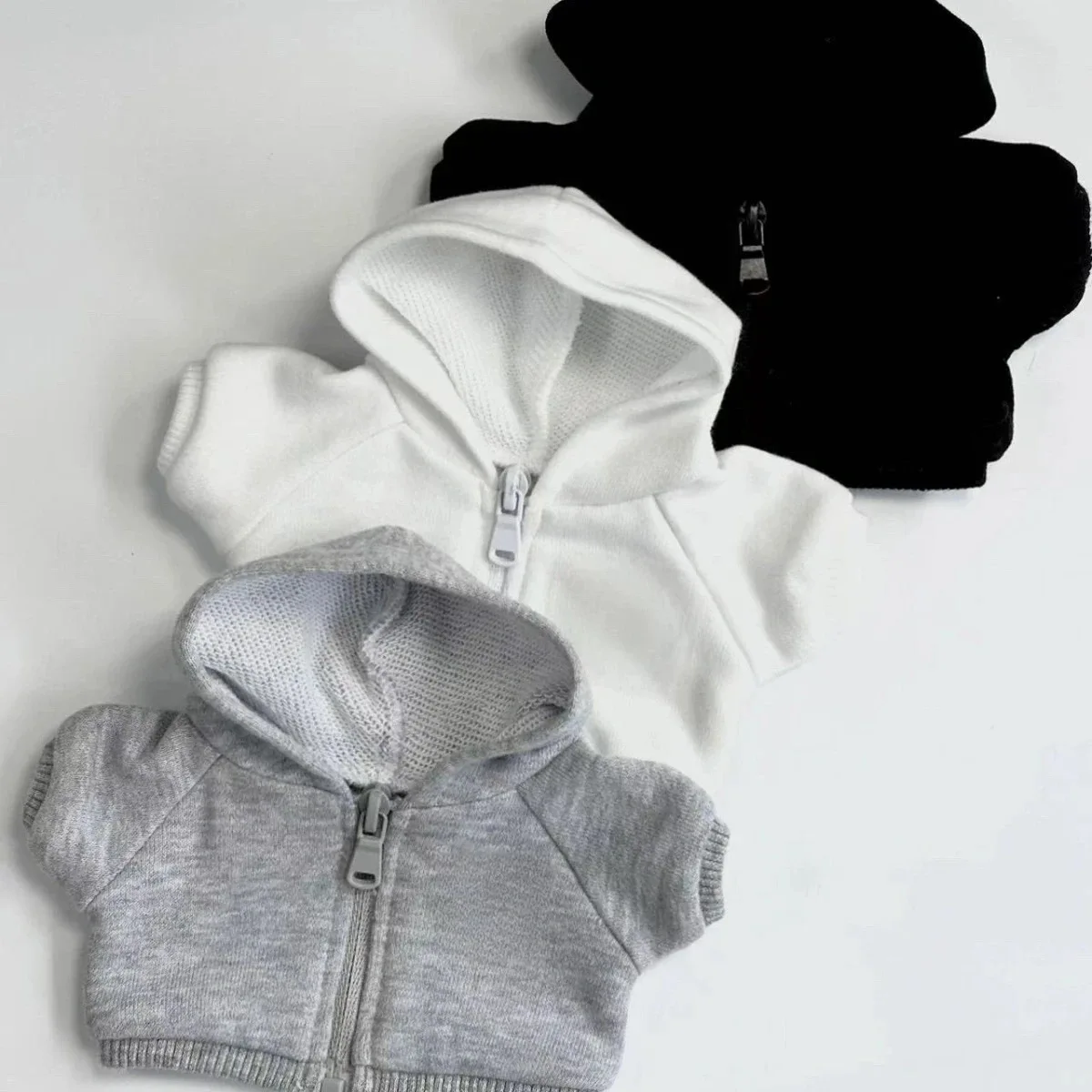 

10cm cotton doll wearing cosplay clothes, hoodie jacket, black and white, minimalist art doll jacket