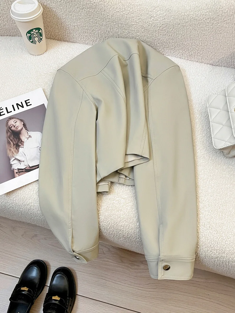 Autumn and winter women\'s casual solid color stand up collar long sleeved loose short jacket