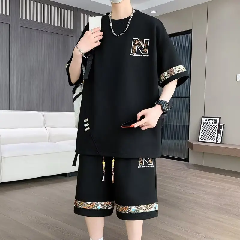 

2025 New Men's Oversized Suit Korean High Street Fashion T-shirt Shorts 2 piece Set Men Trendy O Neck Top Designer Clothes Men
