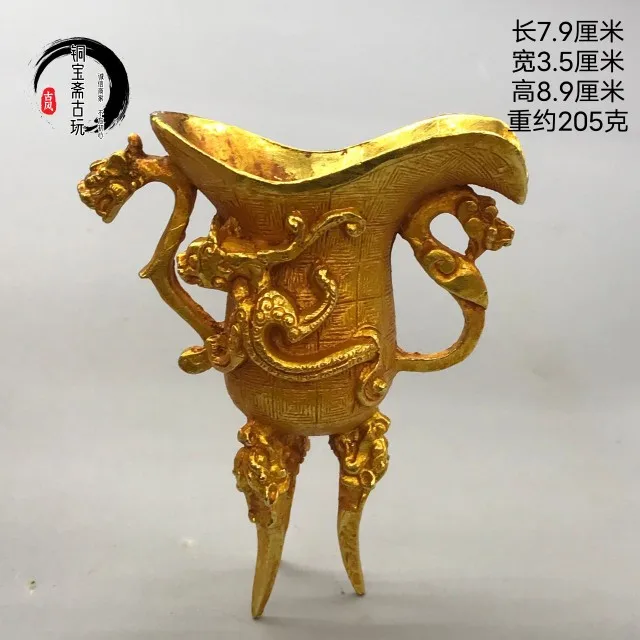 

Antique brass gilt wine bottle, auspicious beast, three-legged jazz cup, ancient wine glass, film television props wine cabinet