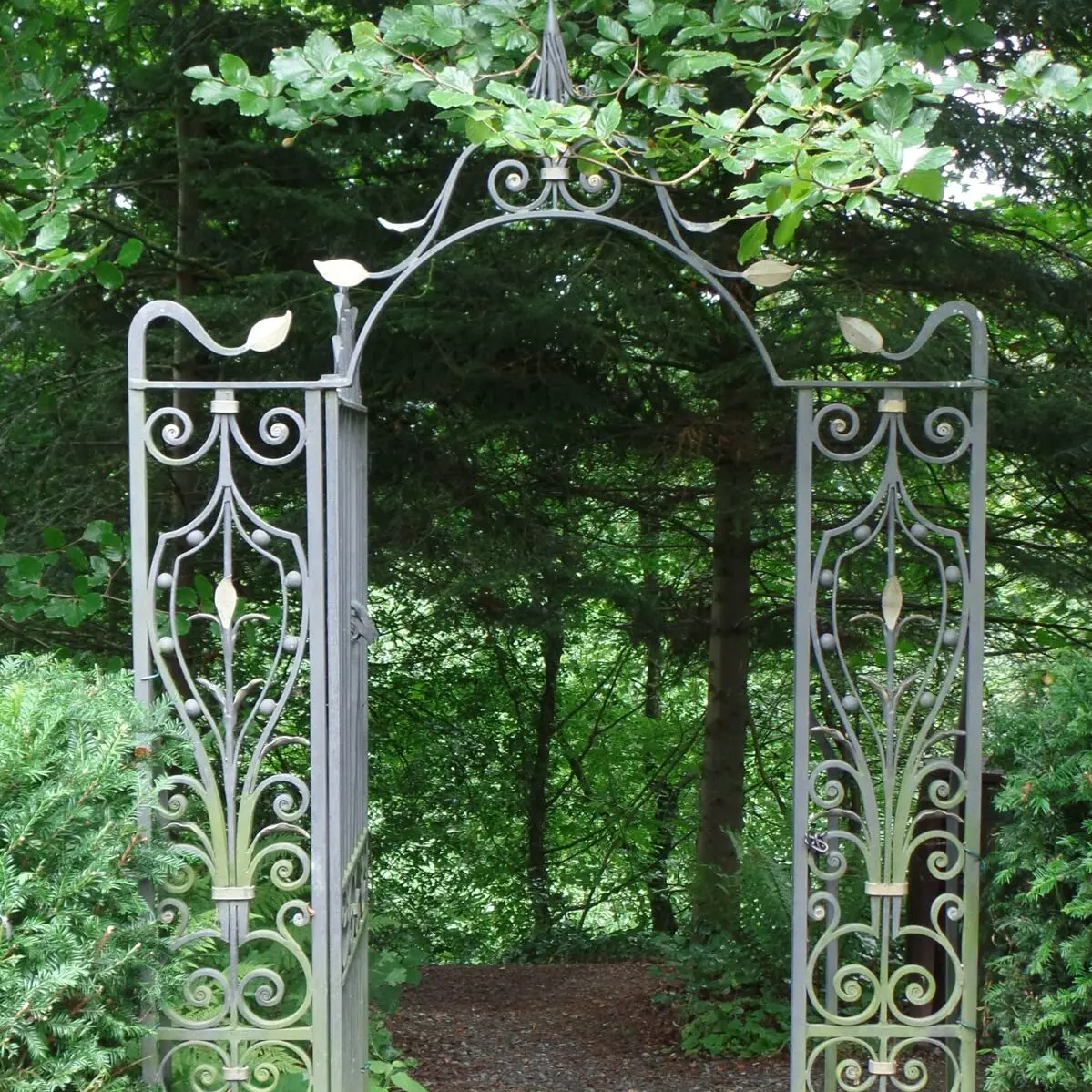 Ornamental Wrought Iron Garden Arch with Scrollwork Design Hand Forged for Climbing Plants and Wedding Ceremonies