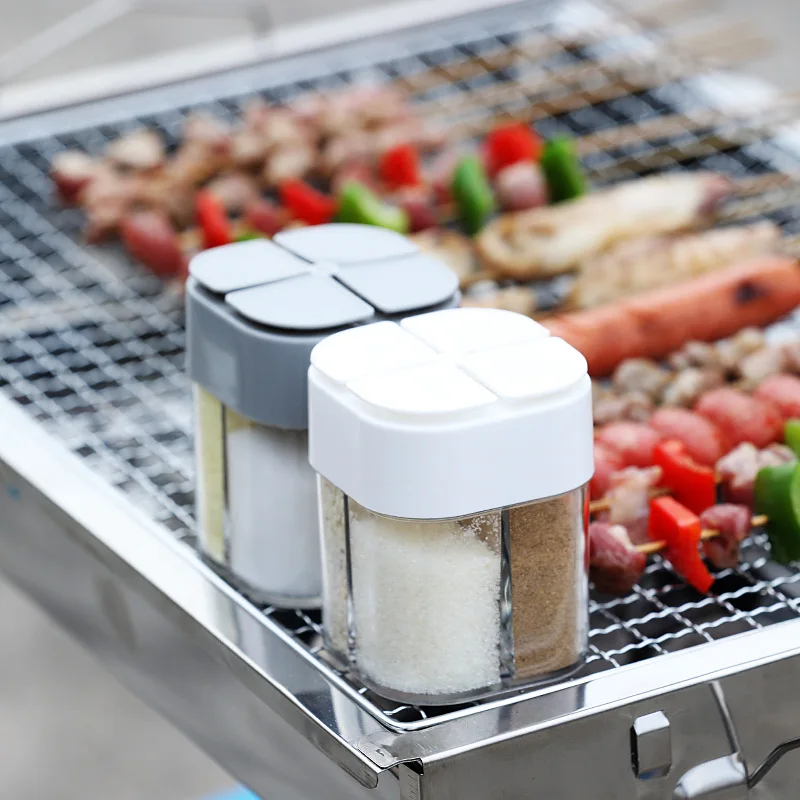 

2pcs Camping Outdoor BBQ Four-in-One Seasoning Box Kitchen Flip Transparent Seasoning Jar Portable Grid Seasoning Box.