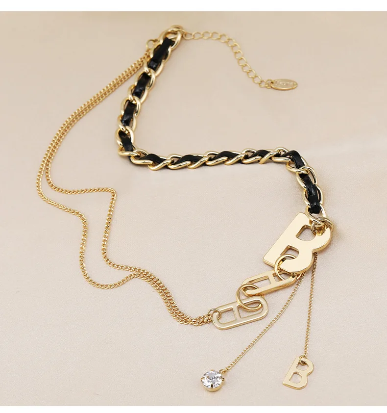 

Exaggerated and unique spliced B-letter necklace, thick titanium steel chain, multi-layer tassel collarbone chain