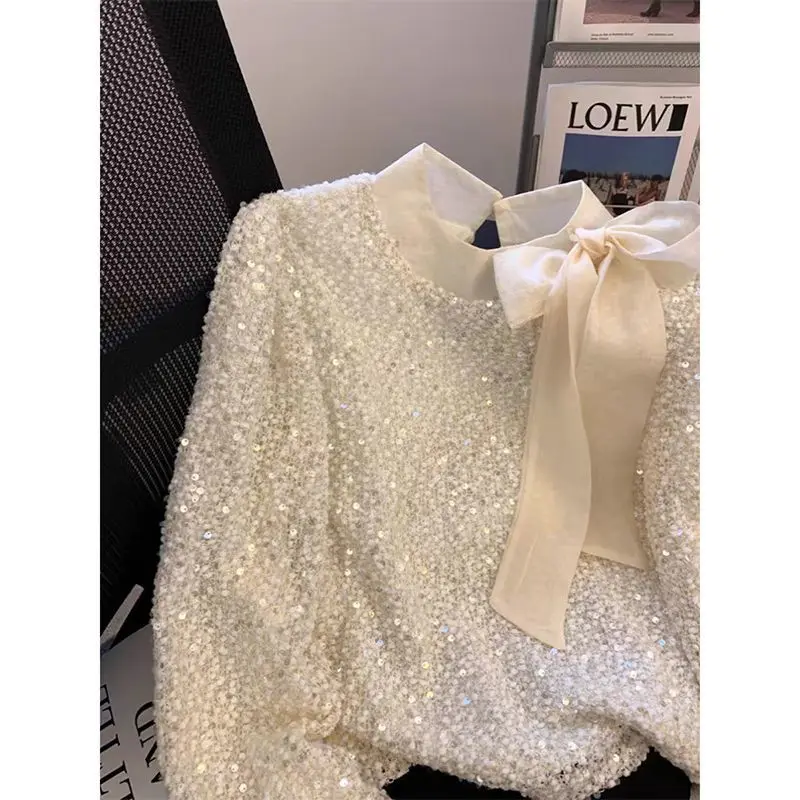 Celebrity sequined bow shirt women's 2025 autumn new Korean chic horn long-sleeved bottoming top