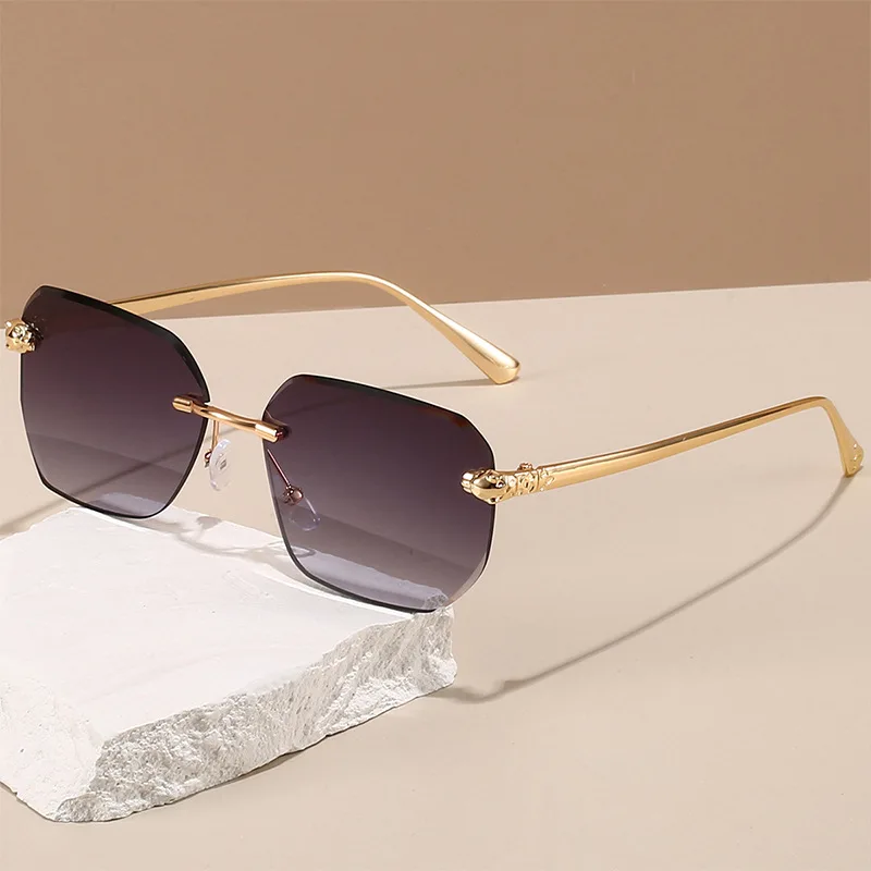 Gafas de sol de moda con diseño de cabeza de leopardo sin montura, directamente de fábrica - nuevas gafas de sol casuales de protección solar para hombre, a la moda.