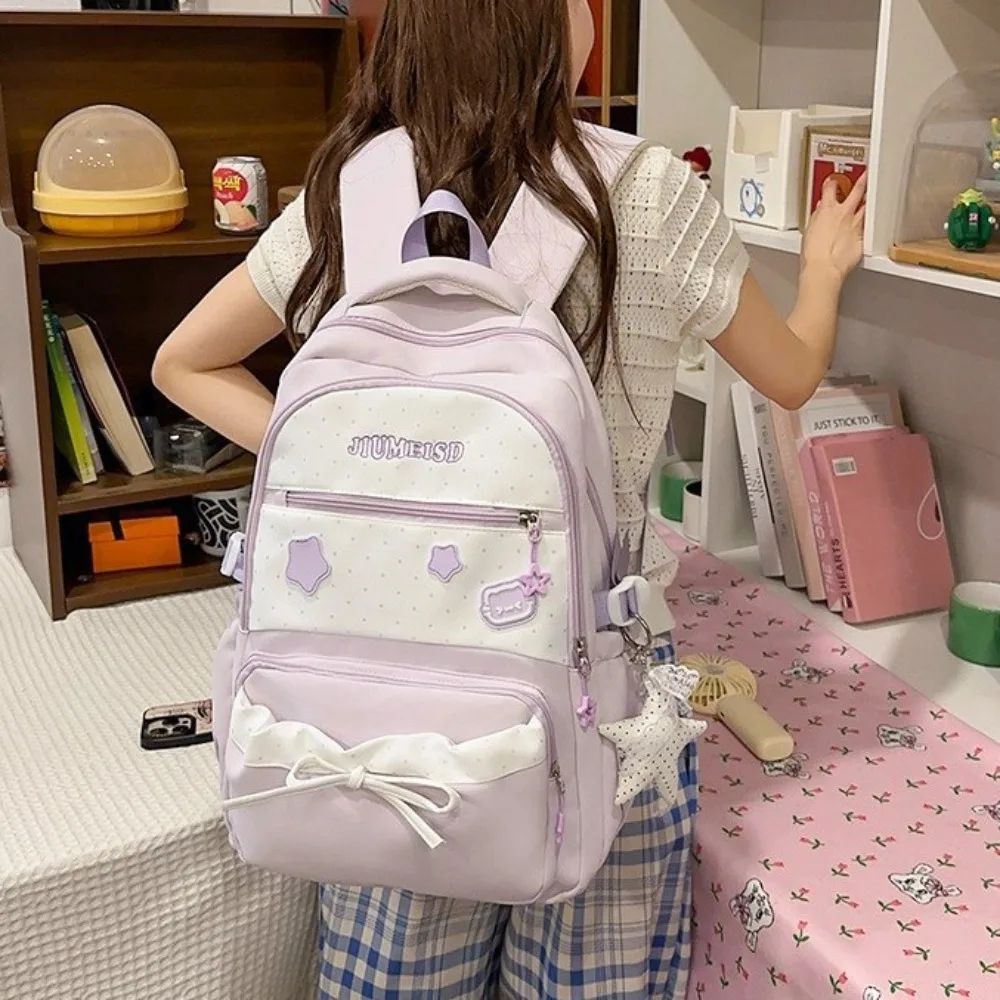 Nylon lightweight student schoolbag polka dot bump bow kawaii pendant large capacity travel backpack for ladies