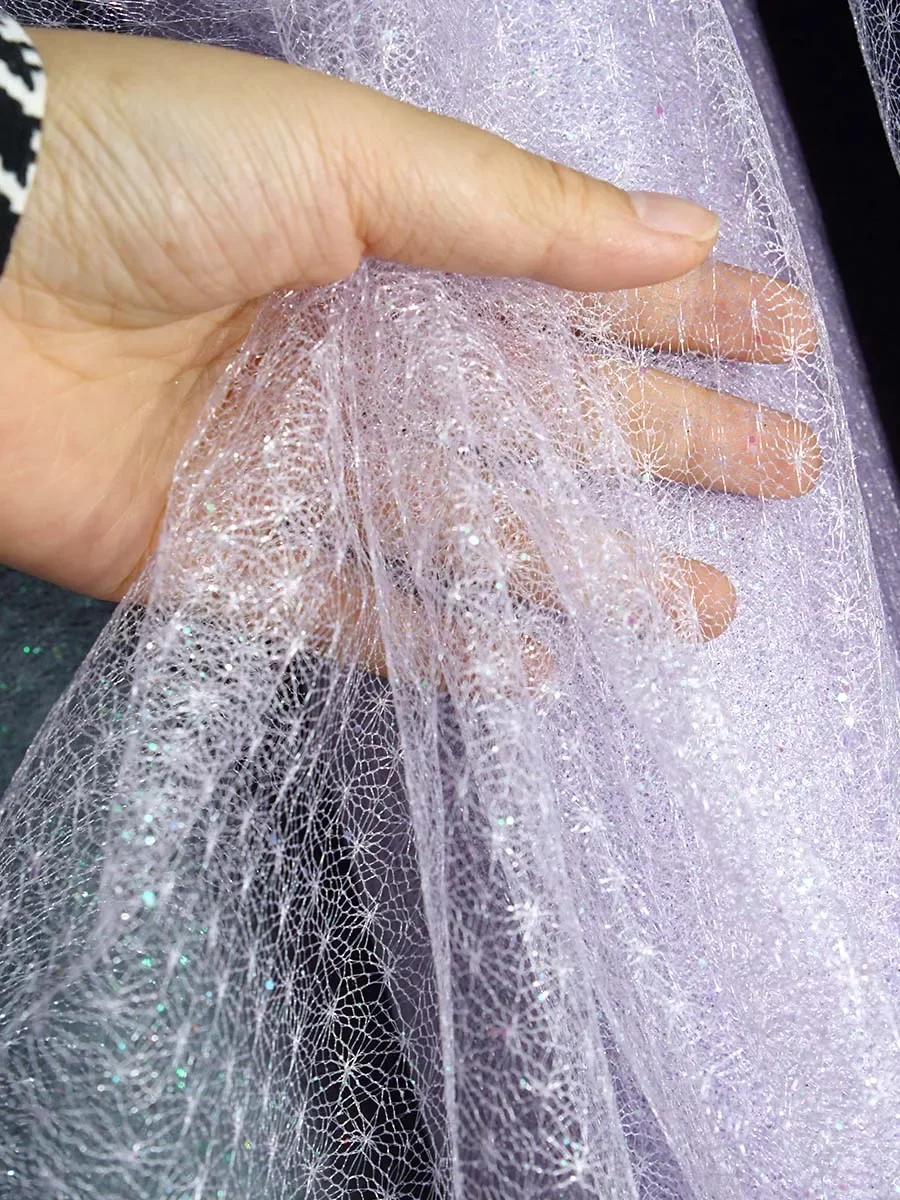 

Translucent And Shimmering Tulle Fabrics In Multiple Colors With Glittering Sequins For Wedding Gowns And Evening Dresses