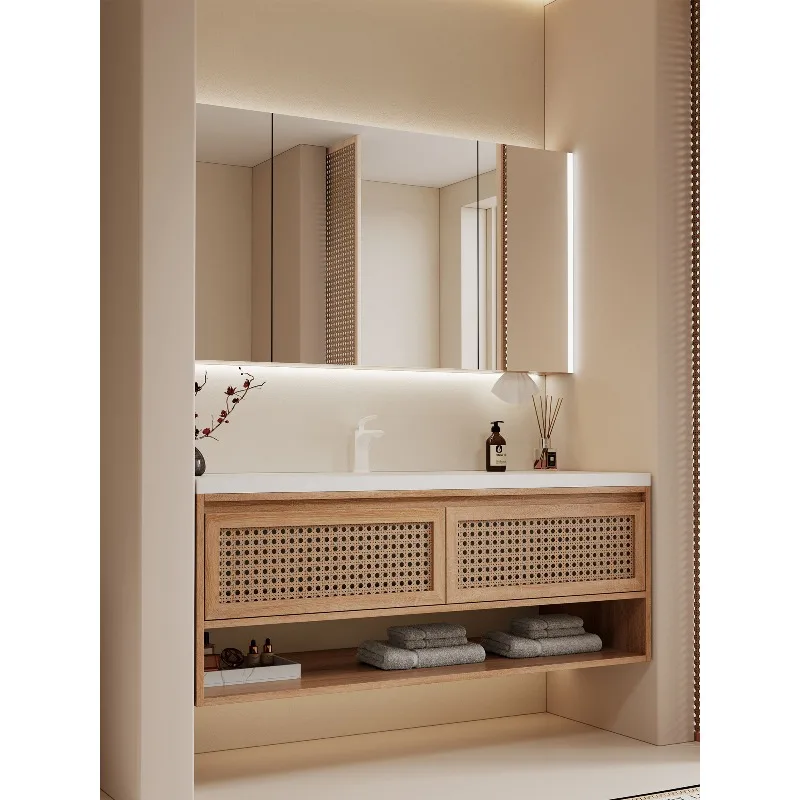 

Комплект мебели для ванной Wabi Sabi: тумба из ротанга и каменной плиты с бесшовной керамической раковиной-умывальником