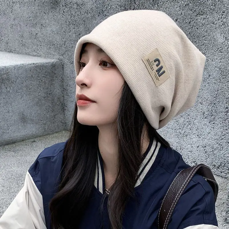 El nuevo estilo de gorro cálido con protección para los oídos, gorro tejido Baotou para mujer, muestra la cara, pequeño sombrero salvaje a prueba de viento para confinamiento