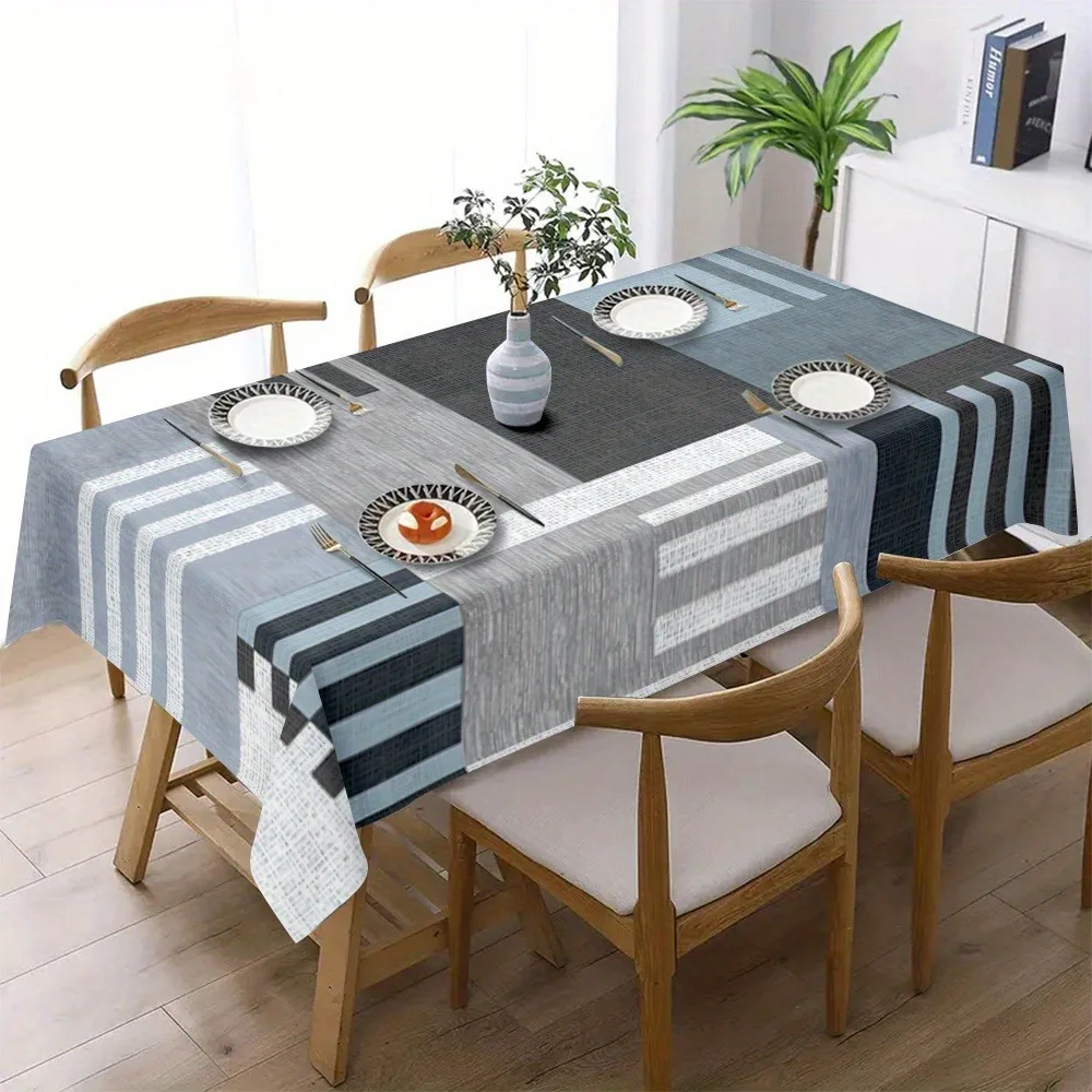 A polyester tablecloth - a perfect gift. Modern blue and grey striped tablecloth. Large rectangular or square shape.