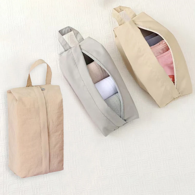 Bolsas de almacenamiento portátiles para brochas de maquillaje, bolsa organizadora impermeable con bolsillo y cremallera Unisex, paquete de almacenamiento de ropa y calcetines de viaje