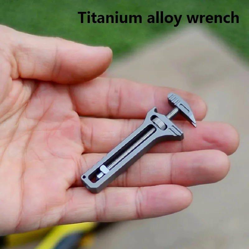 12 in 1 Multifunctional Titanium Alloy Mini Adjustable Wrench, Bottle Opening EDC Self-defense Tool Ruler Phone Holder Keychain